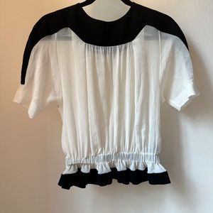 Women’s Isabel Marant black-and-white peplum top. Size 34.